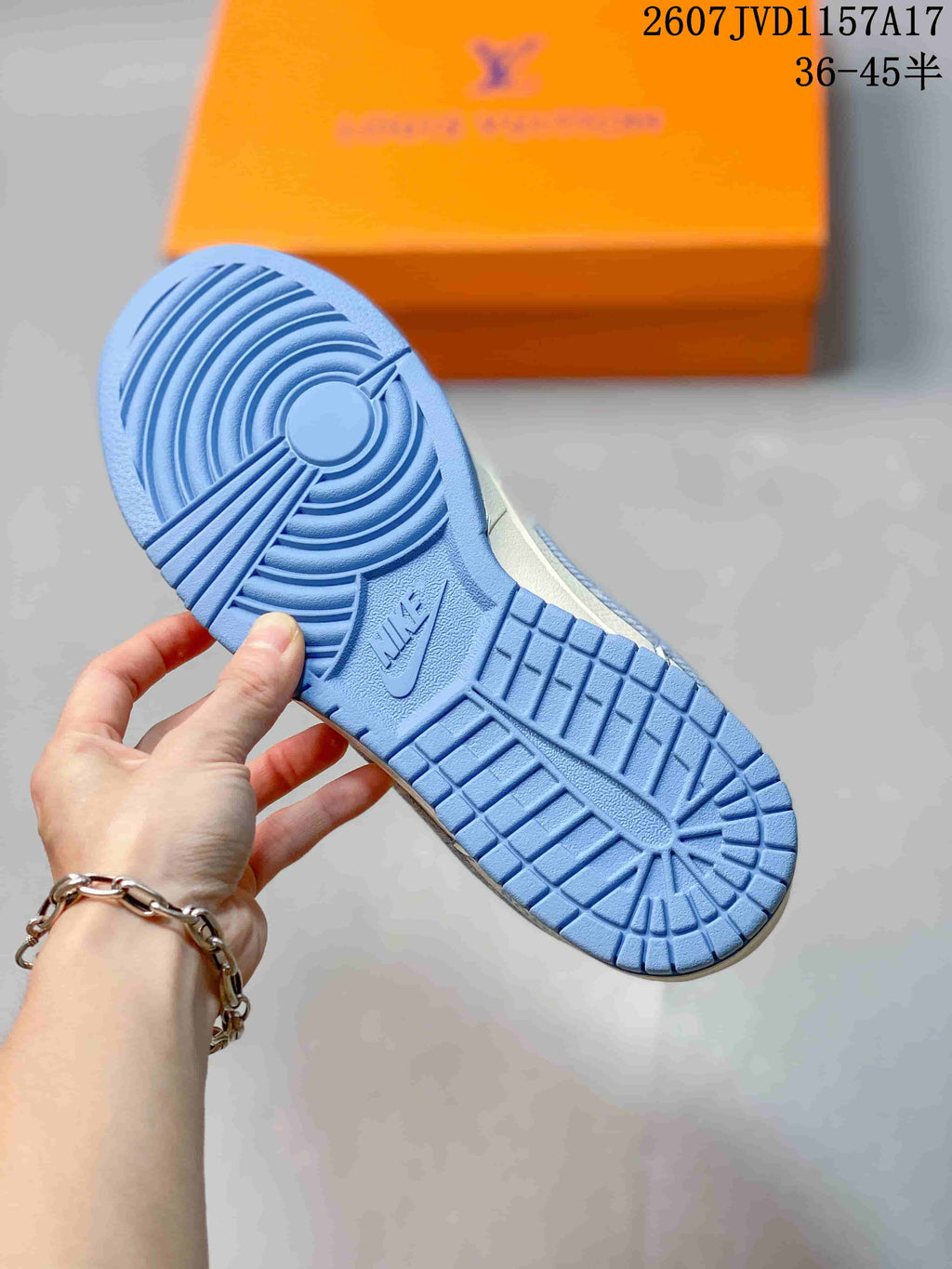Nike Dunk Low Louis Vuitton Sneakers in Ice Blue Denim 2607JVD1157A17 - product image from the listing.
