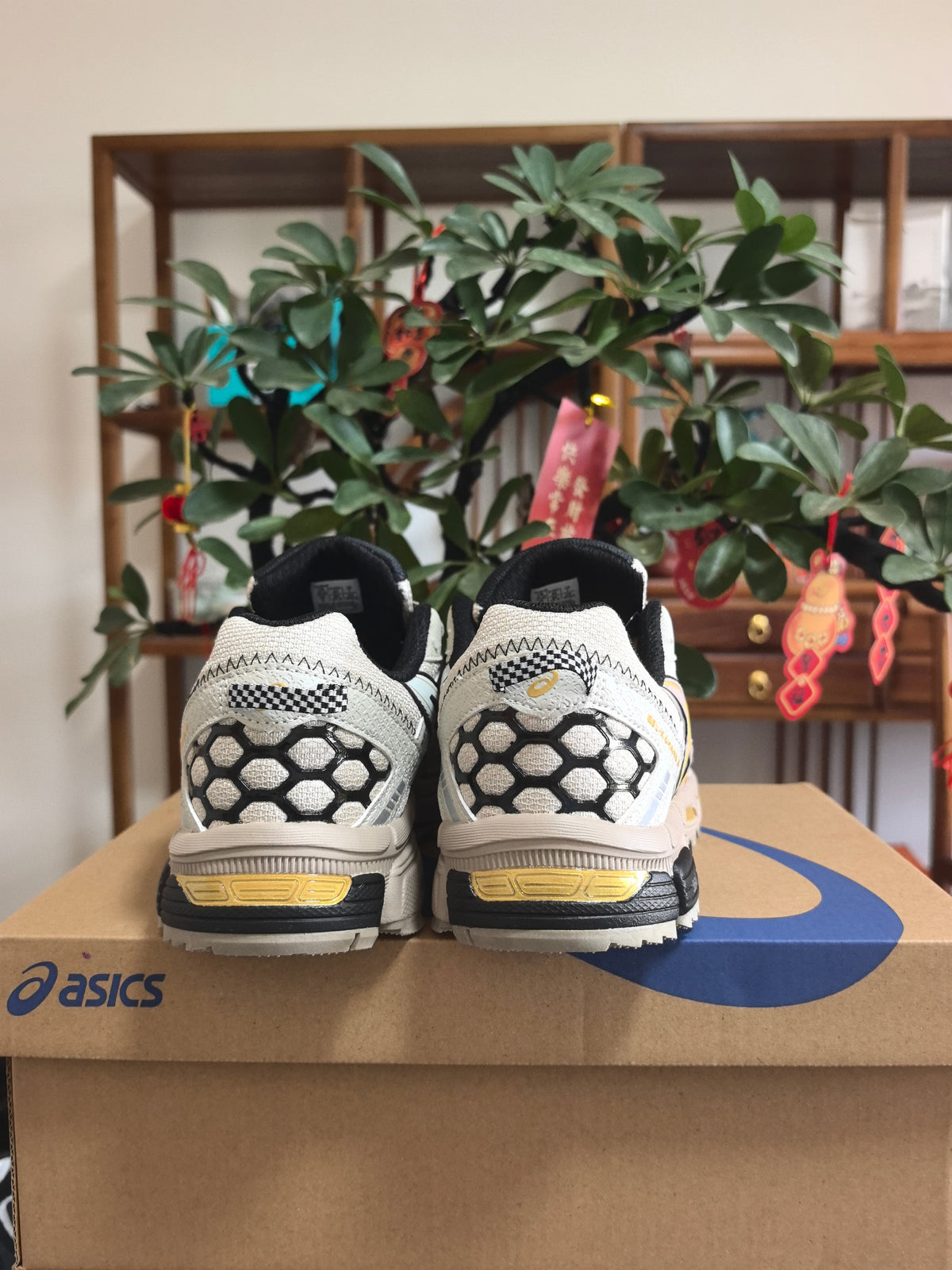 Beige and Gray ASICS K12 Sneakers - product image from the listing.