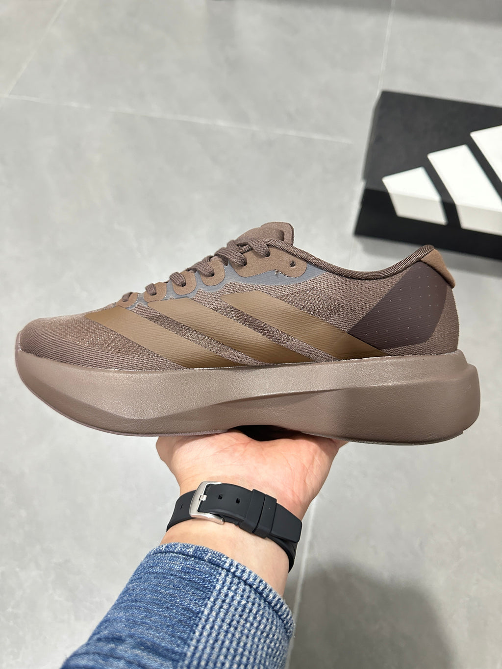 Brown and Tan Adidas Lightstrike Pro Running Shoes - product image from the listing.