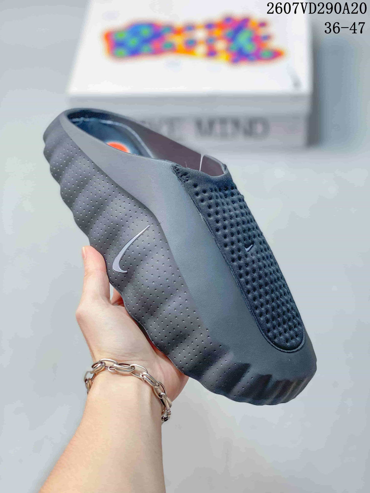 Mind 001 Covered-Toe Slides Slip-On Sandals by Nike - product image from the listing.