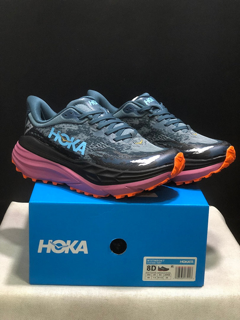 Blue and Orange HOKA Stinson 7 Trail Running Shoes - product image from the listing.