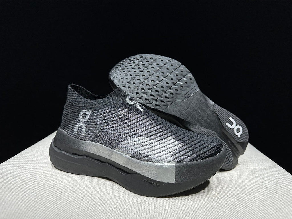 On Cloudboom Strike LS Running Shoes in Black Silver - product image from the listing.