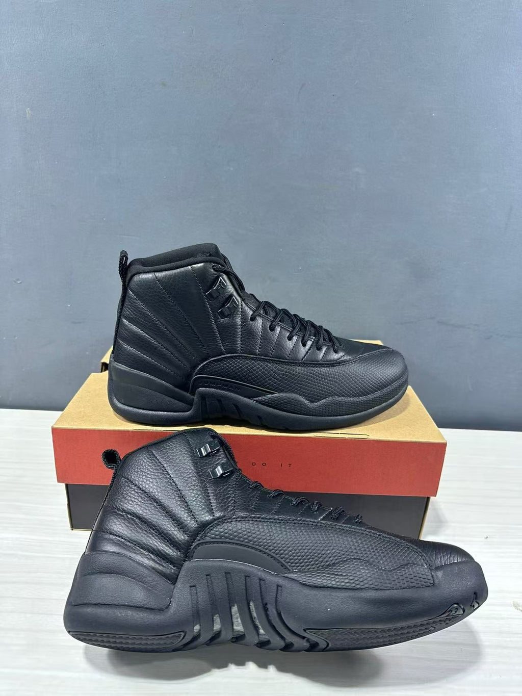 Air Jordan 12 High-Top Sneakers Black - product image from the listing.