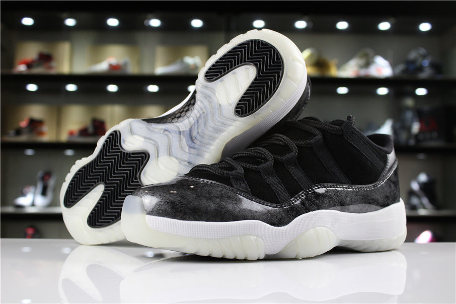 Jordan 11 Retro Low Barons Sneakers in Black White - product image from the listing.