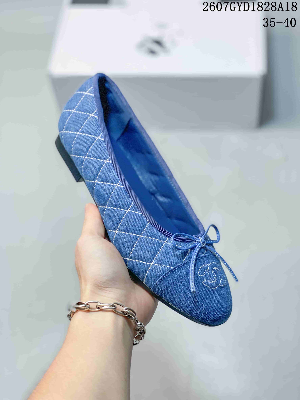 Chanel 26P Washed Denim Ballet Flats in Black and Blue - product image from the listing.