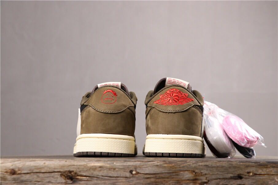 Dark Mocha Travis Scott Sneakers - Jordan 1 Low - product image from the listing.