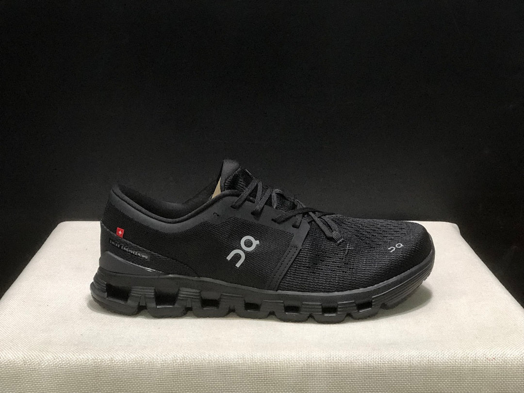 On Cloud X 4 Black Eclipse Trainers - product image from the listing.