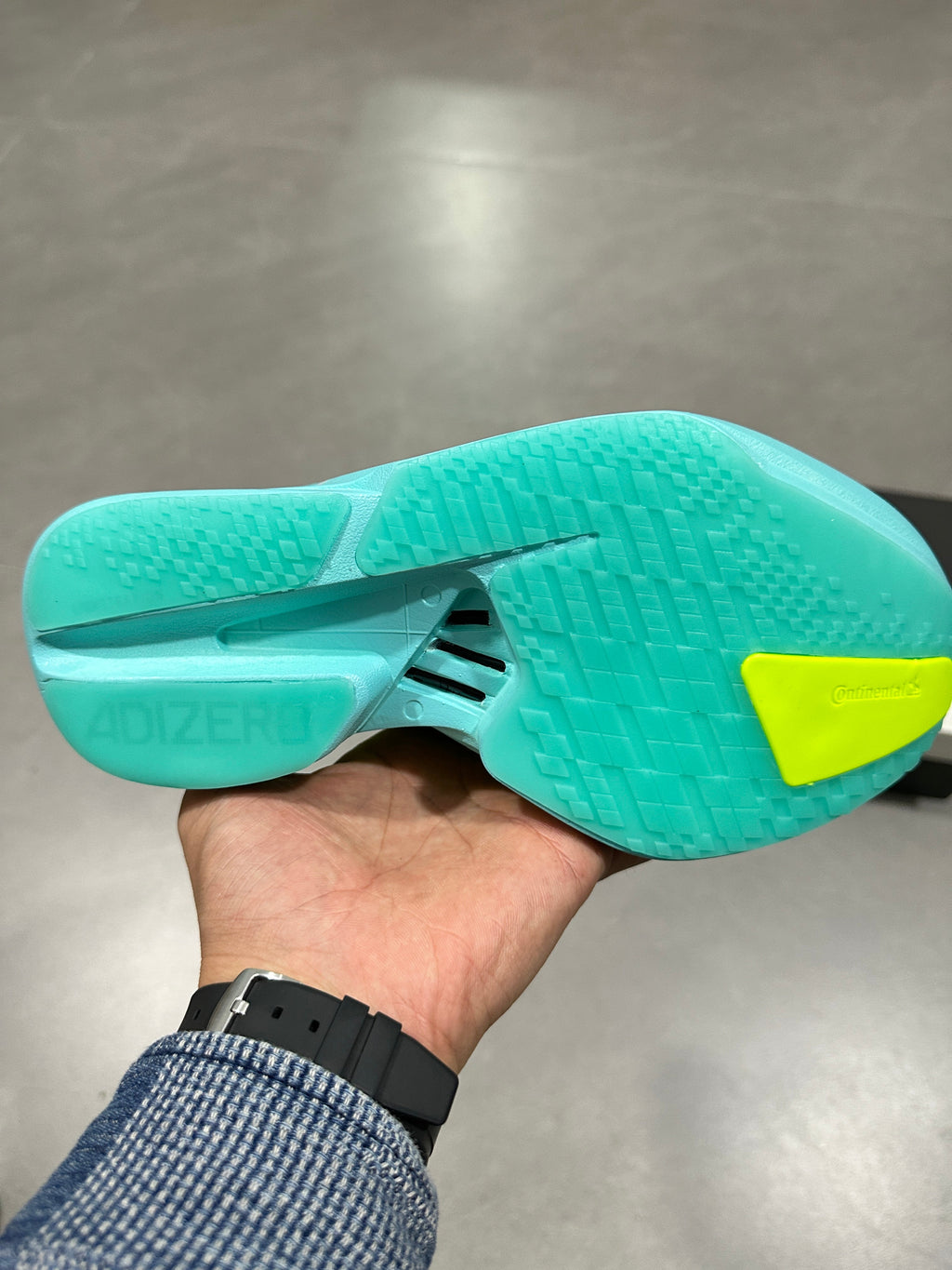 Aqua and Volt Nike Lightstrike Pro Running Shoes - product image from the listing.