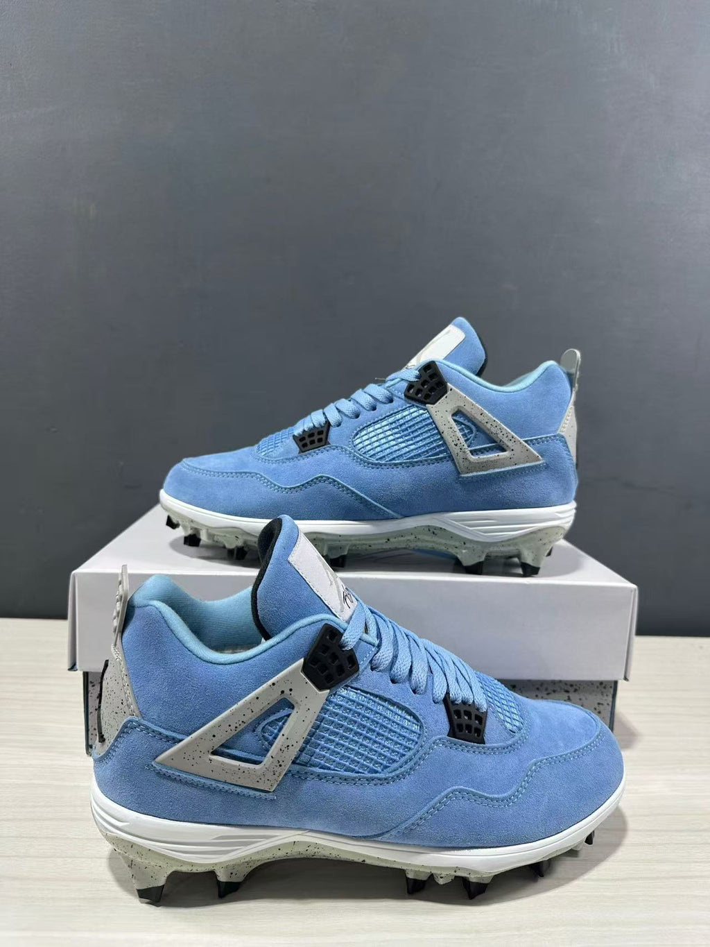Air Jordan 4 University Blue Cleats CT8572-400 - product image from the listing.