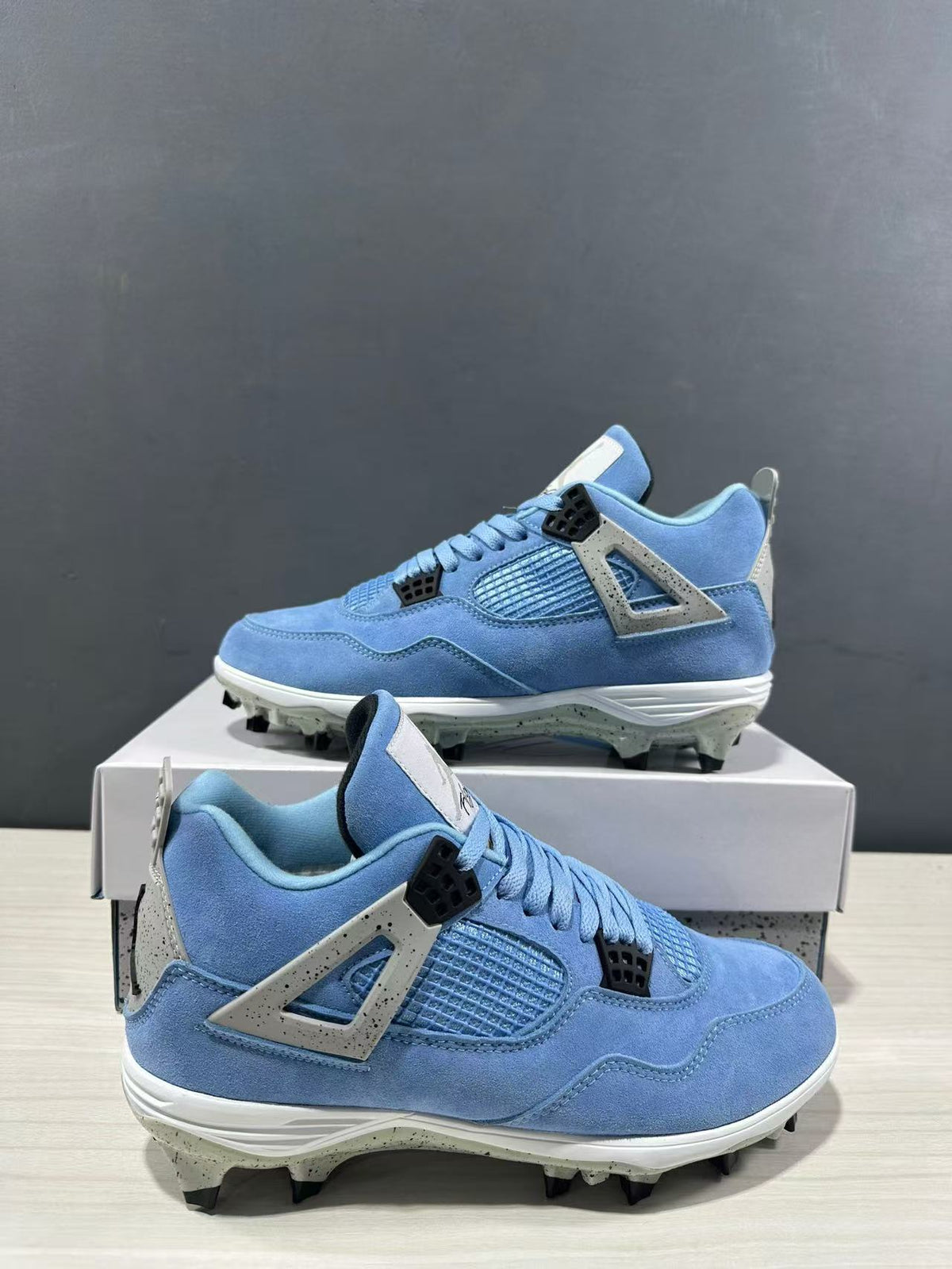 Air Jordan 4 University Blue Cleats CT8572-400 - product image from the listing.