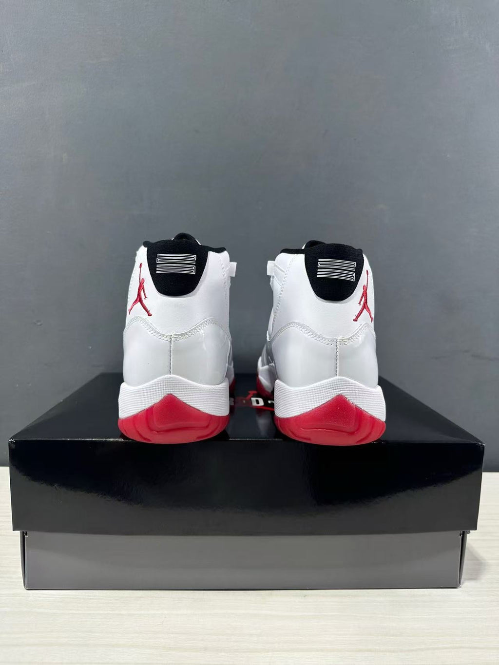 Air Jordan 11 Retro Low White Red CT8012-160 - product image from the listing.