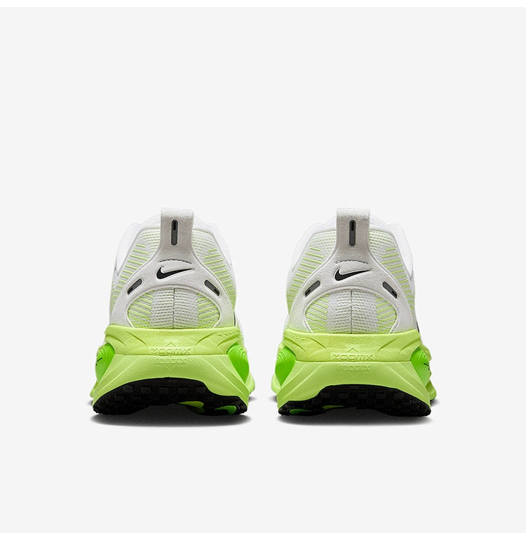 Nike Vomero 18 Running Shoes in White Green HM6803-100 - product image from the listing.