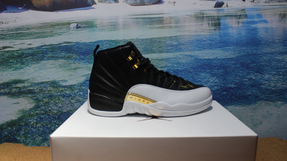 Air Jordan 12 Wings Black White Gold Sneakers 848692-033 - product image from the listing.