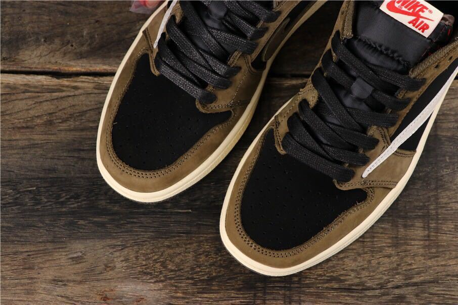 Dark Mocha Travis Scott Sneakers - Jordan 1 Low - product image from the listing.