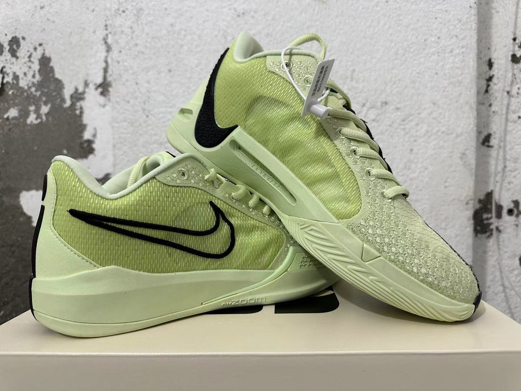 Pale Yellow and Black Nike Zoom Basketball Shoes - product image from the listing.