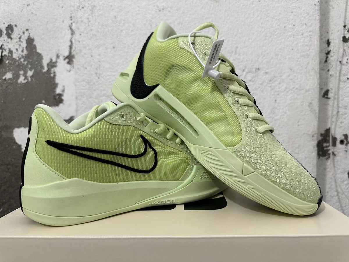 Pale Yellow and Black Nike Zoom Basketball Shoes - product image from the listing.