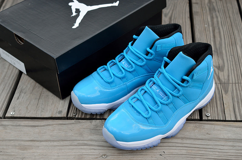 Blue and White Air Jordan 11 High Sneakers - product image from the listing.