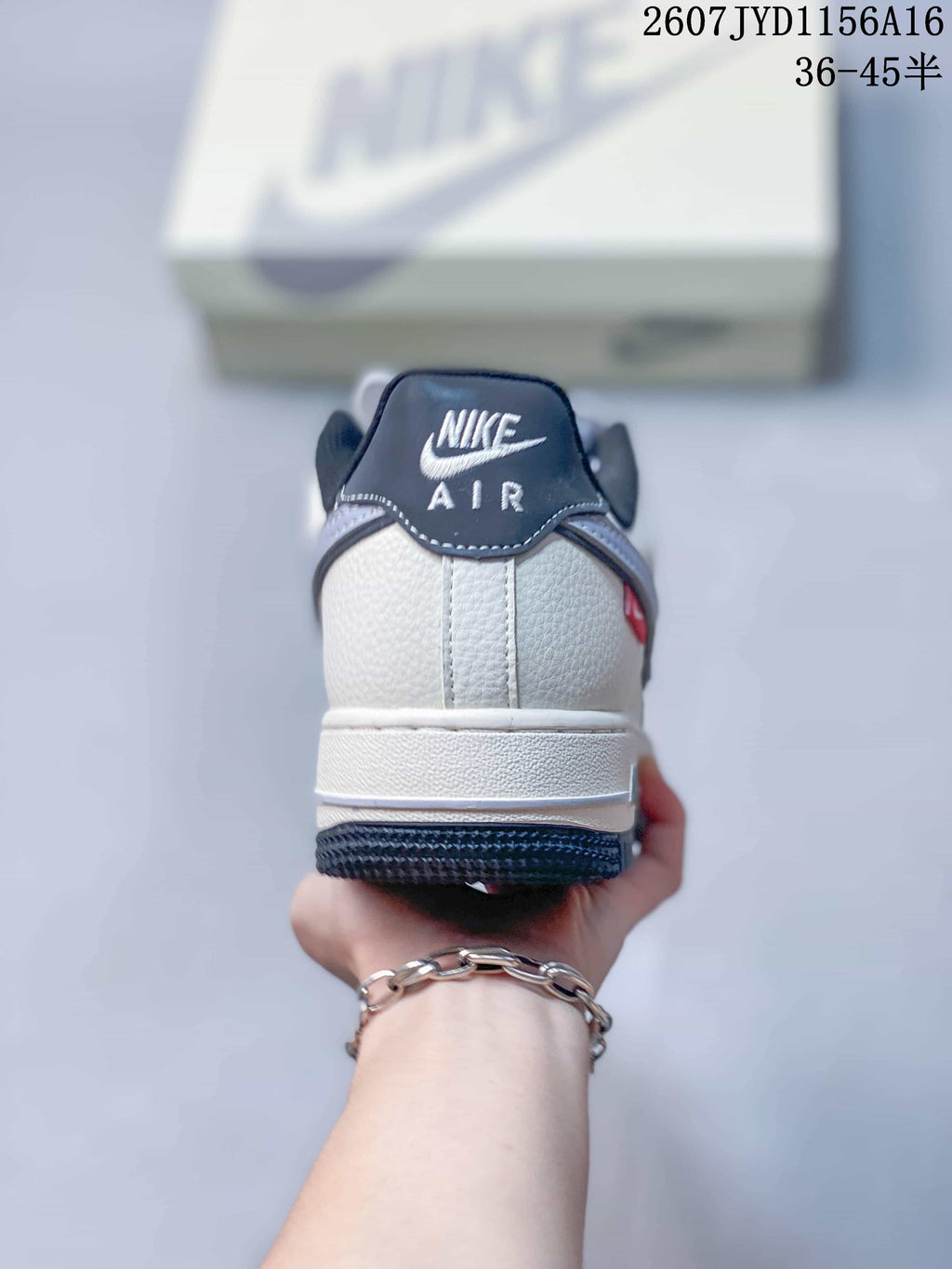 Nike Air Force 1 '07 Low Sneakers in White Grey Black - product image from the listing.