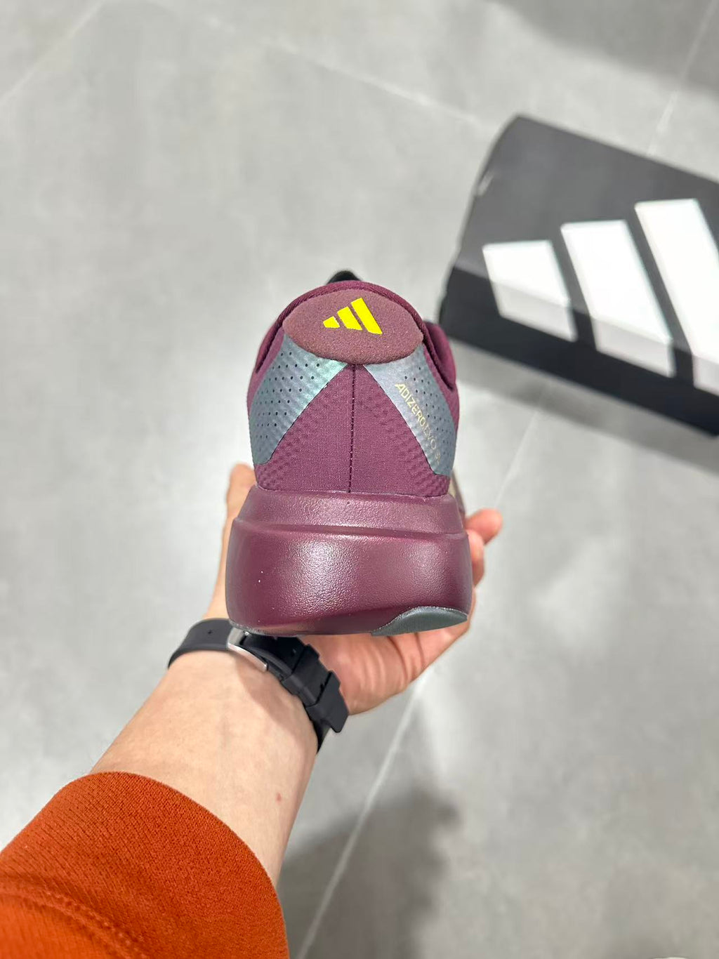 Adidas Lightstrike Pro Running Shoes in Burgundy Gold JQ4443 - product image from the listing.