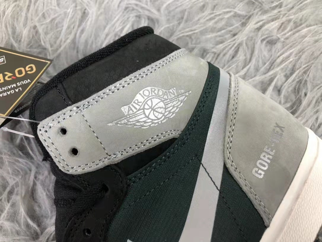 Air Jordan 1 Element Gore-Tex High-Top Sneakers in Black Grey - product image from the listing.