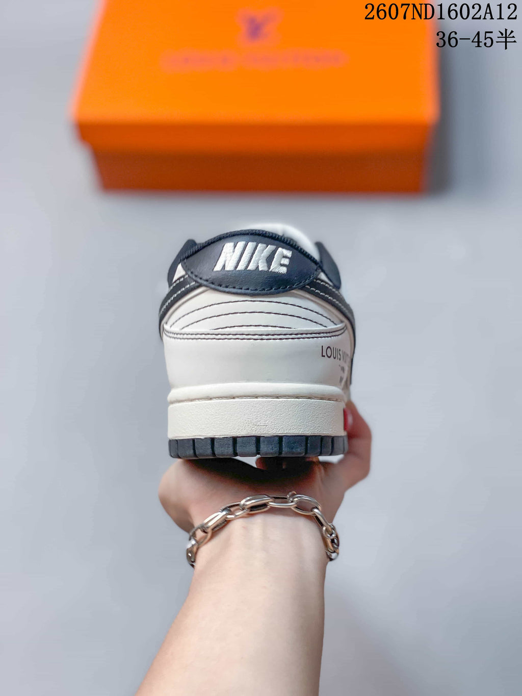 Nike SB Dunk Low Trainers White Black Red Style 2607ND1602A12 - product image from the listing.