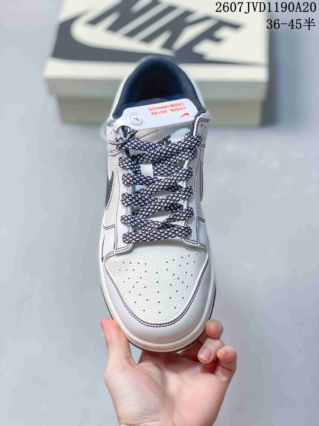 Nike SB Dunk Low Low-Top Sneakers in Off-White Black - product image from the listing.