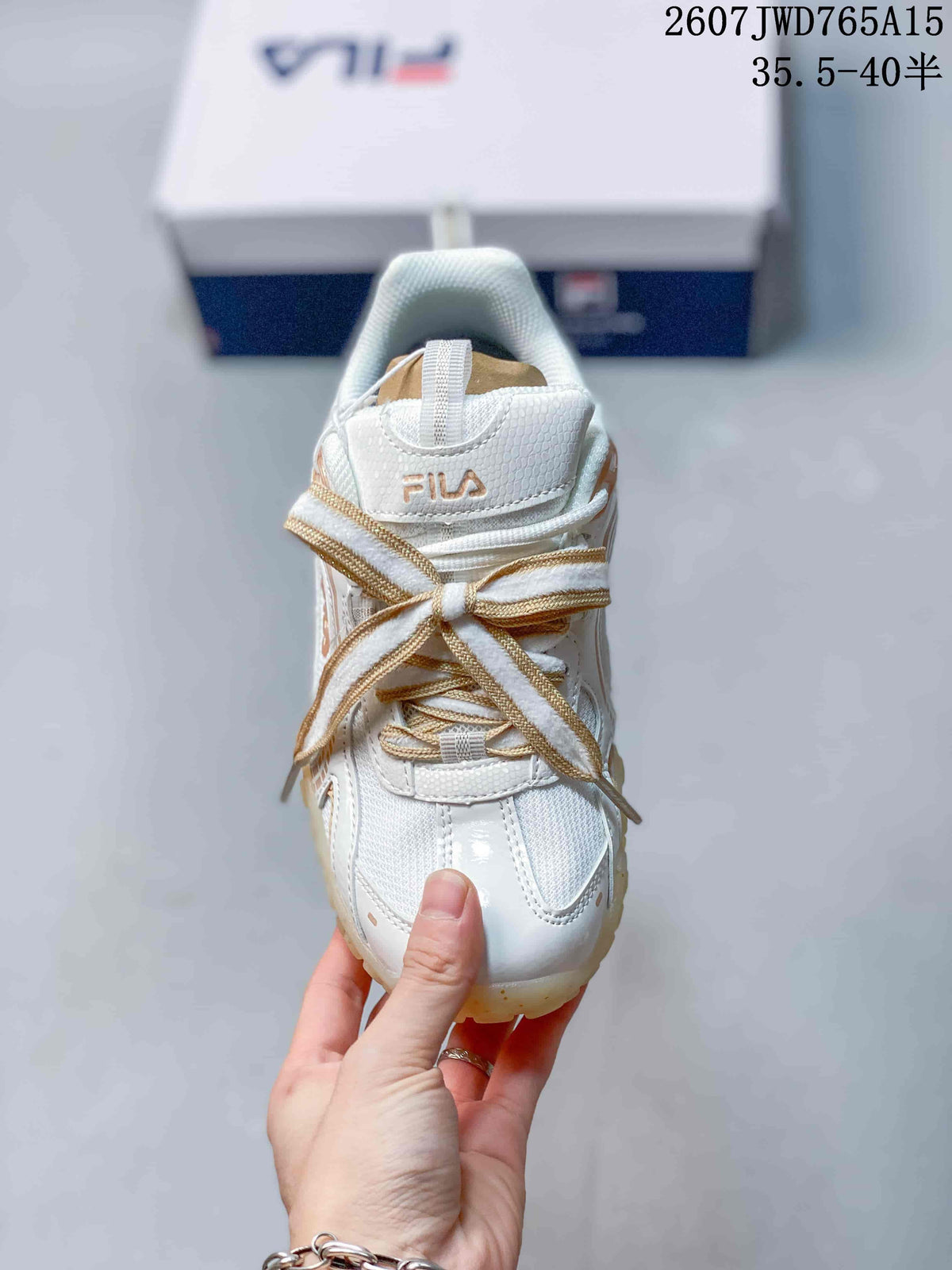 Women's FILA Pebble White Gold Sneakers 711650UTU - product image from the listing.