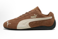 Puma Brown Low-Cut Sneakers with White Side Stripe - product image from the listing.