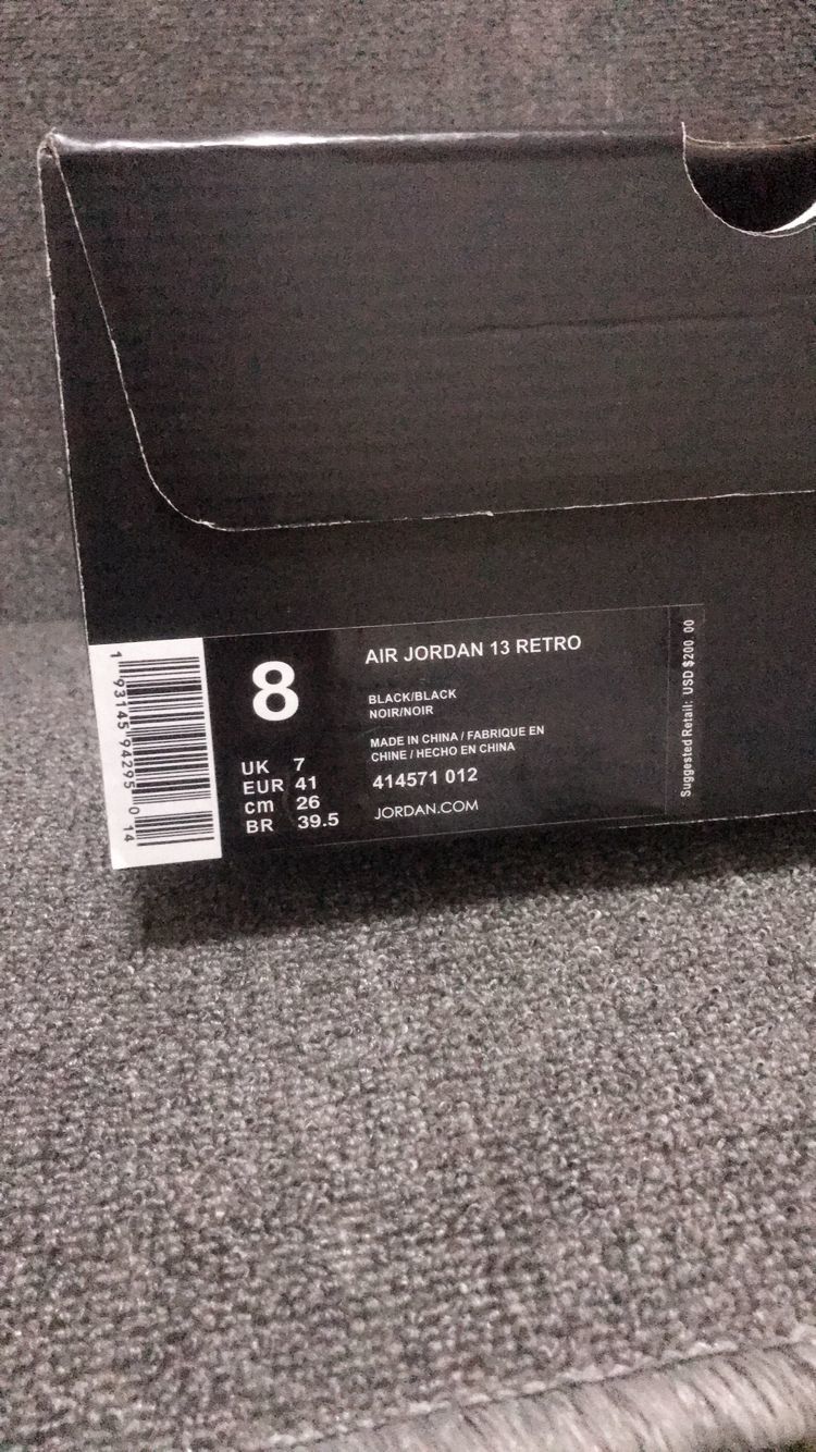 Air Jordan 13 Retro Cap and Gown Sneakers in Black - product image from the listing.
