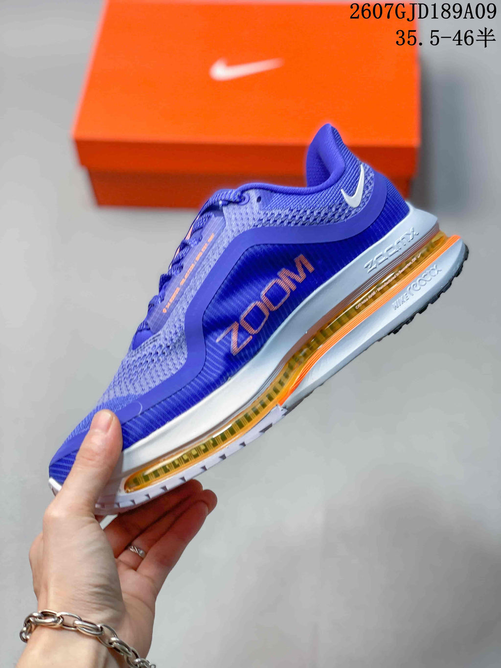 Nike Vomero Premium Running Shoes in Blue - product image from the listing.