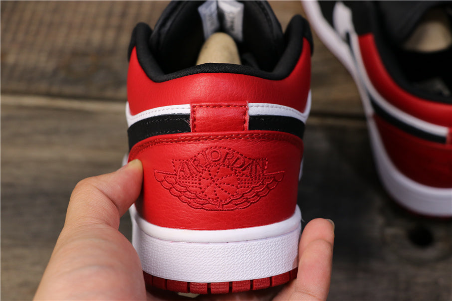 Air Jordan 1 Low Black Toe Sneakers 553558-116 - product image from the listing.