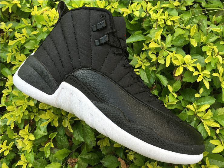 Air Jordan 12 Black Nylon High-Top Sneakers - product image from the listing.