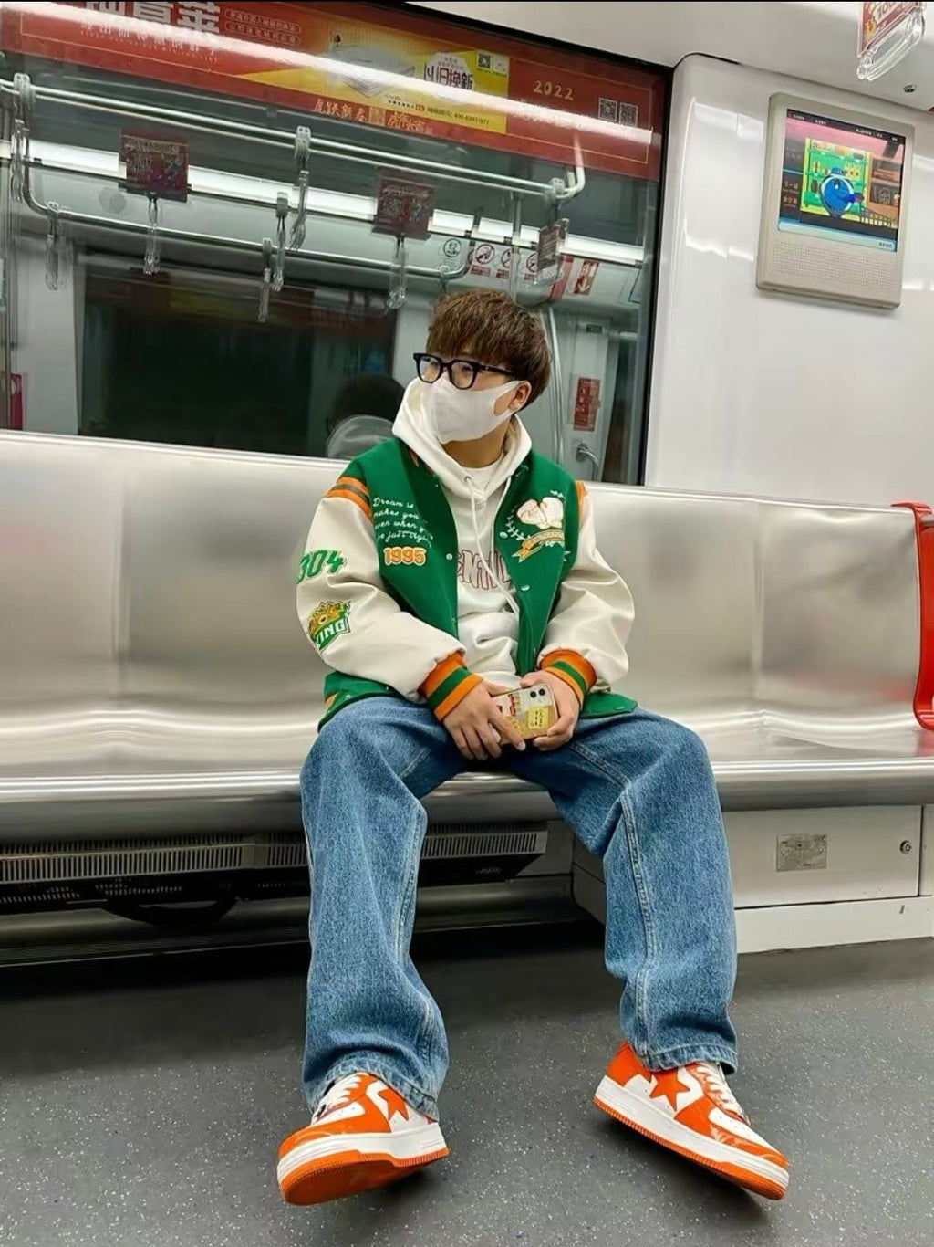 A Bathing Ape BAPE STA Low Sneakers in White Orange - product image from the listing.