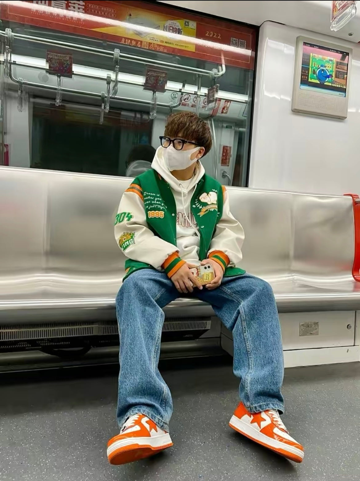A Bathing Ape BAPE STA Low Sneakers in White Orange - product image from the listing.