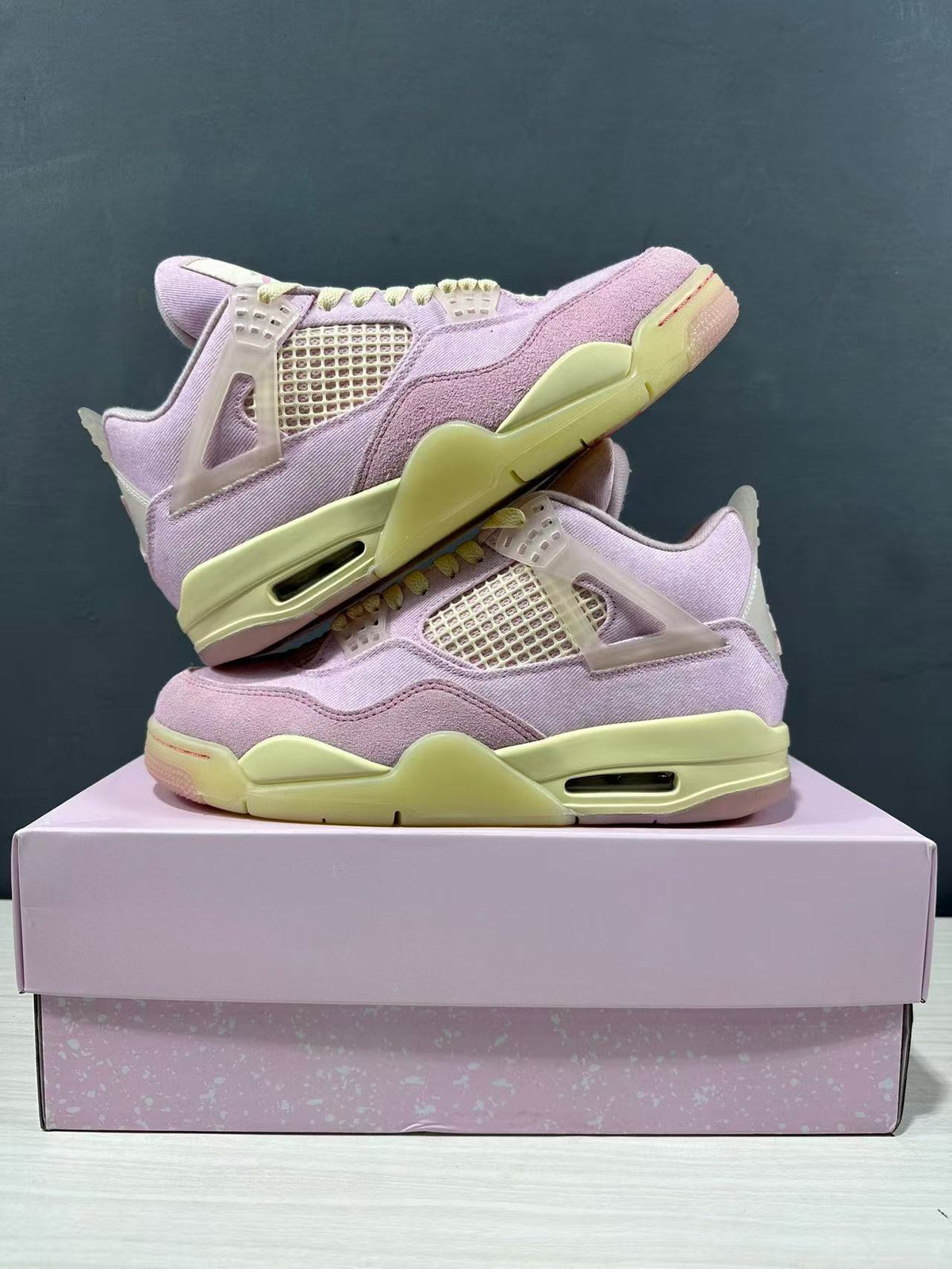 Air Jordan 4 Retro Pink Sneakers IB6716-600 - product image from the listing.