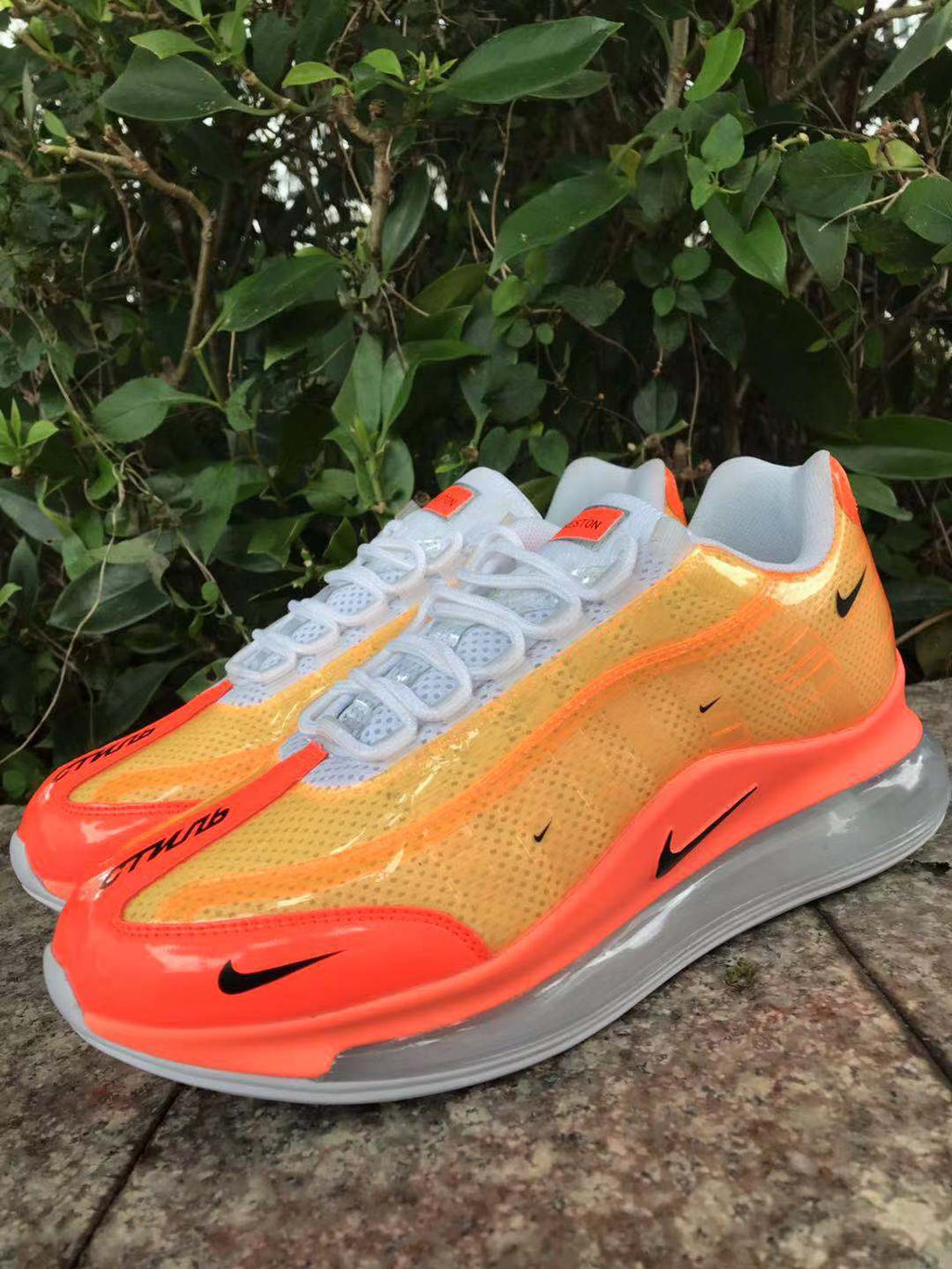 Orange and Yellow Nike Air Max 720 Sneakers - product image from the listing.