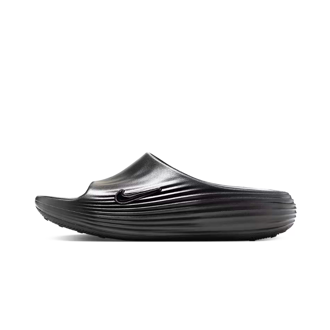 Nike ReactX Rejuven8 Slide in Black - product image from the listing.