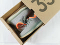 Grey and Orange Yeezy 350 V2 Kids Sneakers - product image from the listing.