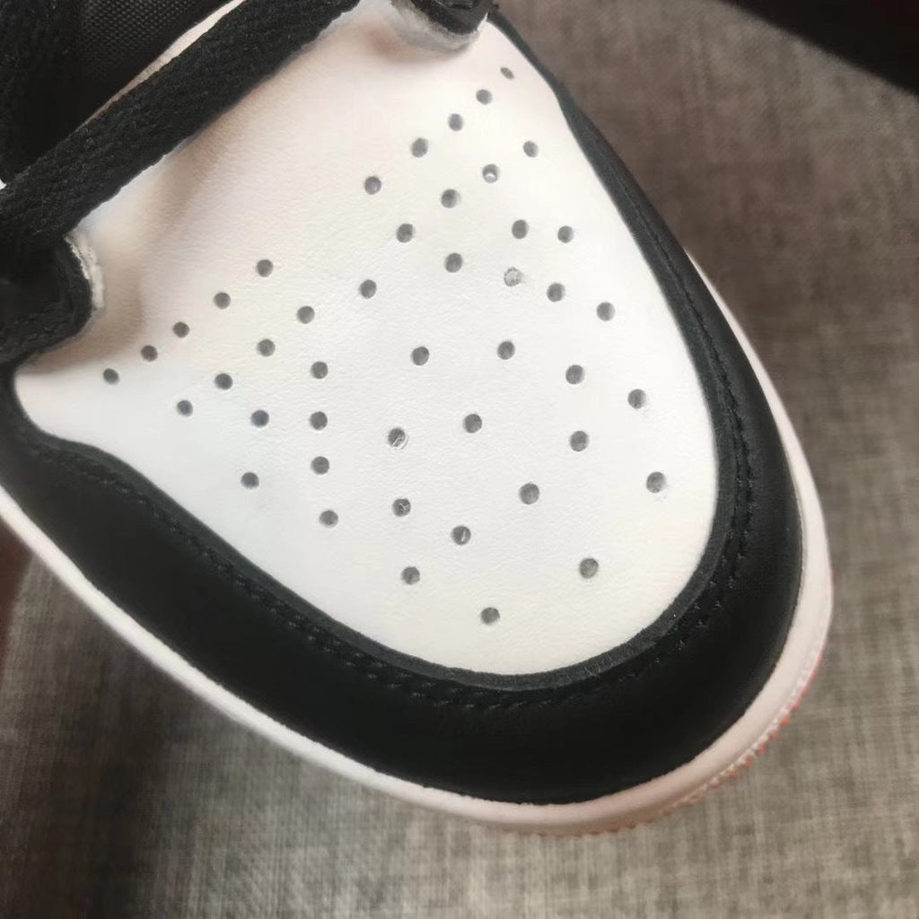 Jordan 1 Retro High OG Electro Sneakers in Orange - product image from the listing.