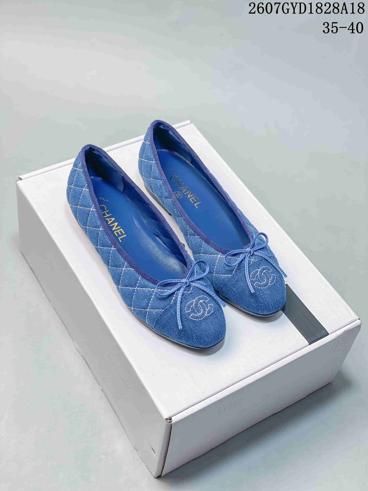 Chanel 26P Washed Denim Ballet Flats in Black and Blue - product image from the listing.
