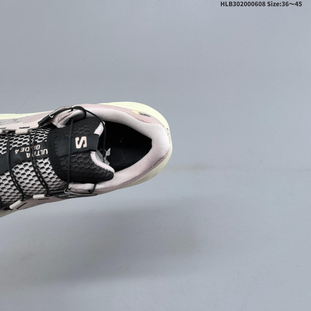 Salomon Ultra Glide 4 Trail Running Shoes, in Pink and Cream - product image from the listing.