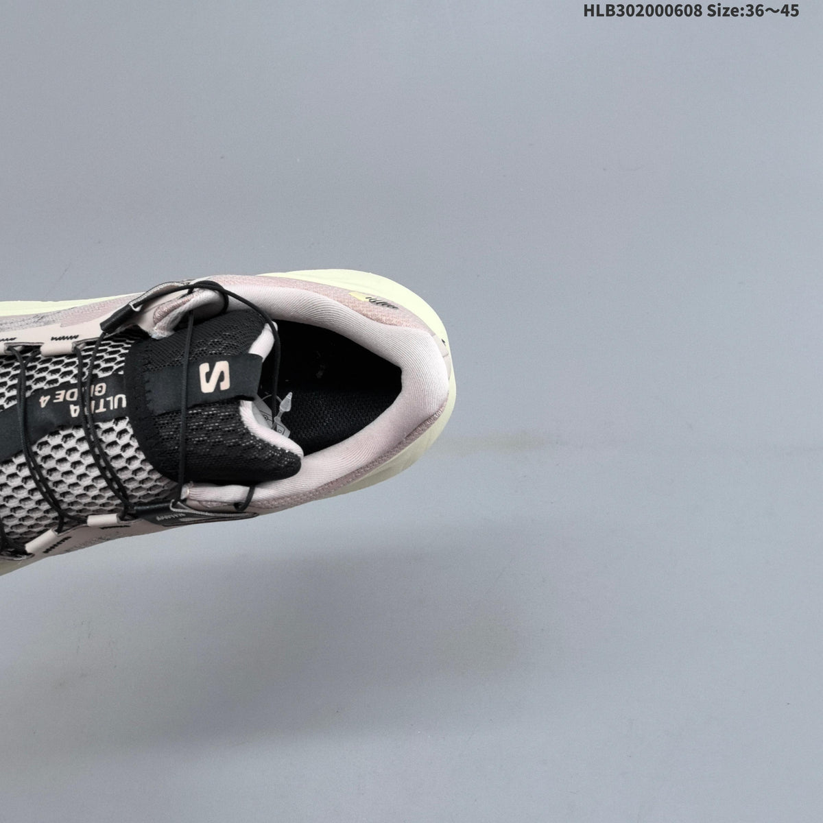 Salomon Ultra Glide 4 Trail Running Shoes, in Pink and Cream - product image from the listing.