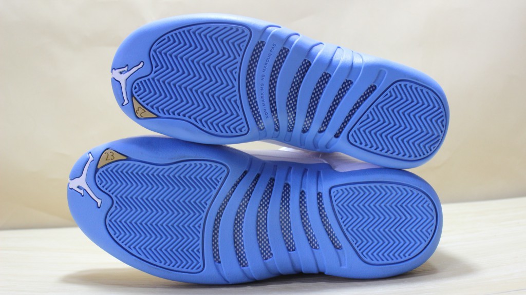 Air Jordan 12 High-Top Sneakers in University Blue 510815-127 - product image from the listing.