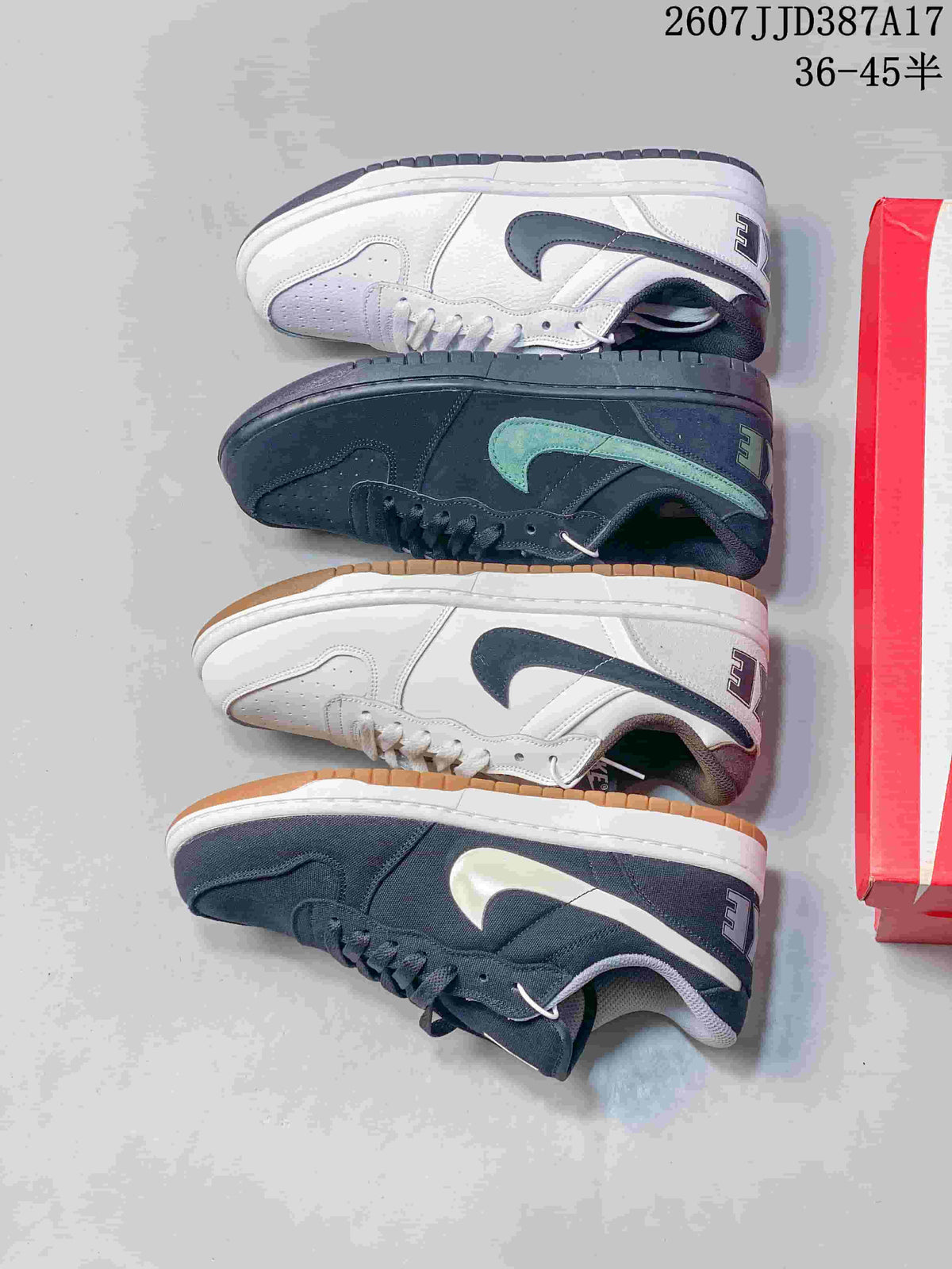 Nike Big Nike Low Sneakers in Black, Green, in White and Navy - product image from the listing.