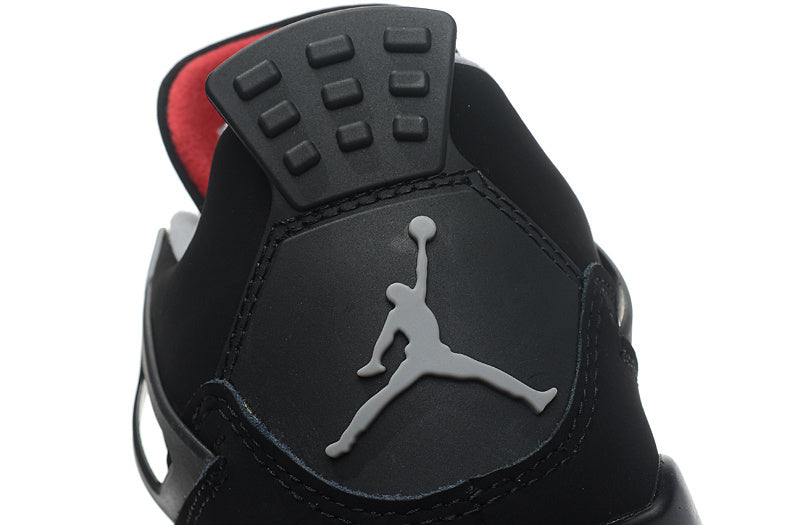 Jordan 4 Retro Basketball Shoes in Black/Red - product image from the listing.