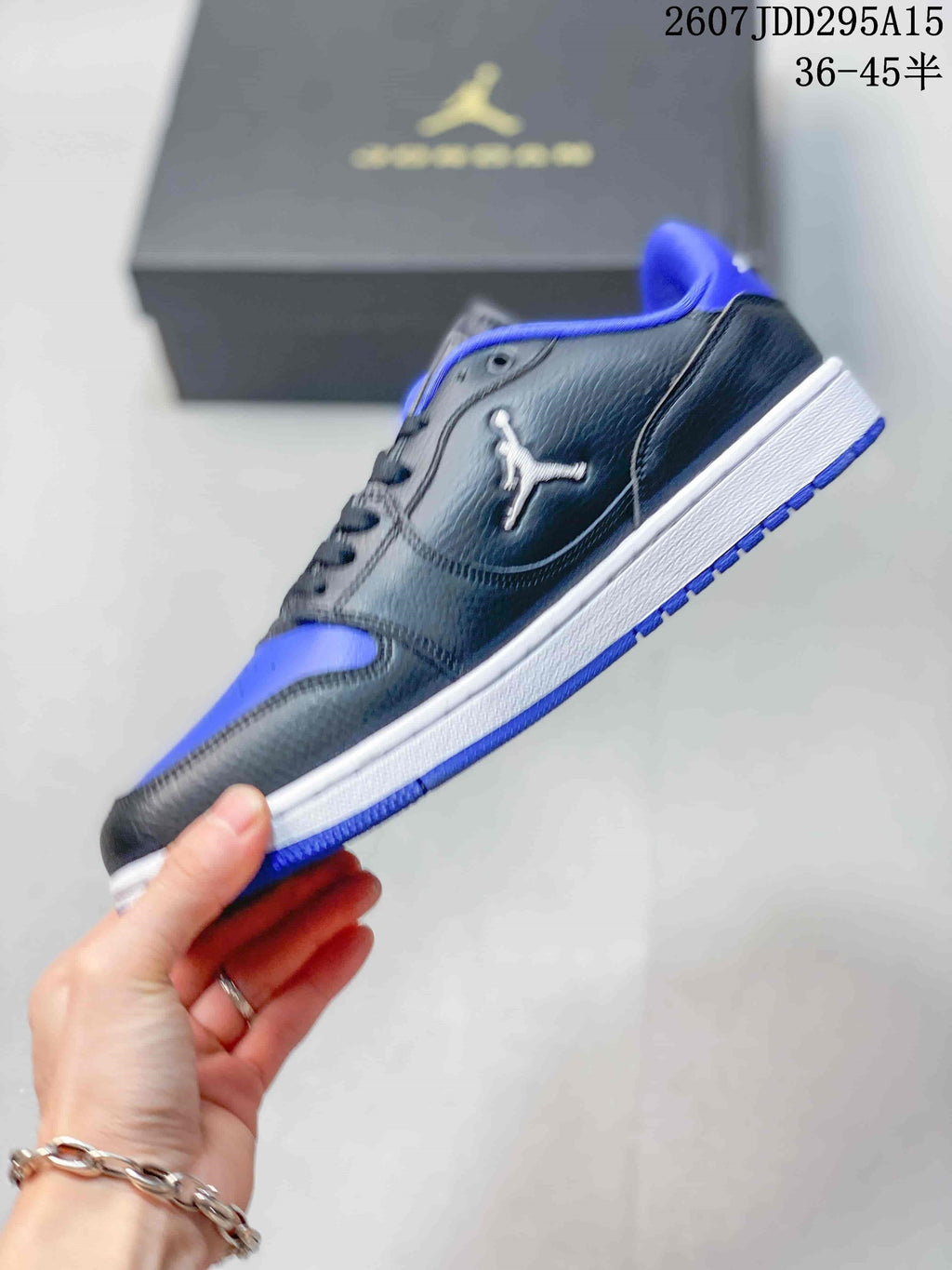 Air Jordan 1 Low Sneakers Black Blue 2607JDD295A15 - product image from the listing.