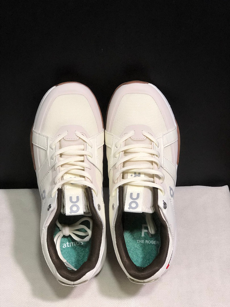 On THE ROGER Clubhouse Pro Tennis Shoes in White Brown - product image from the listing.