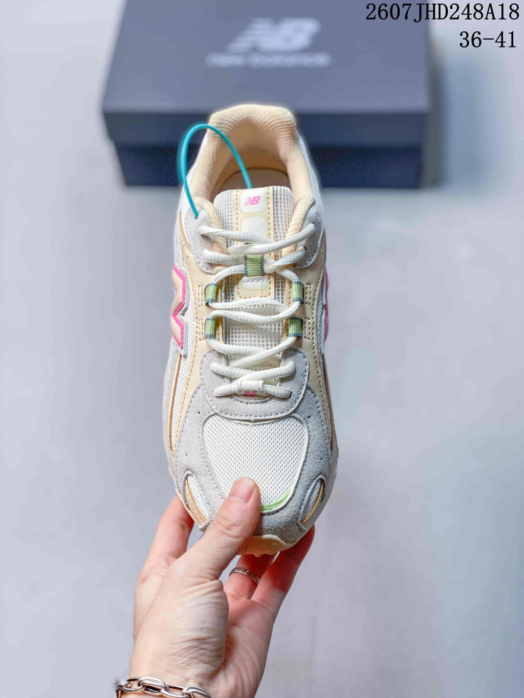 Cream and Gray New Balance 204L Low-Top Sneakers - product image from the listing.