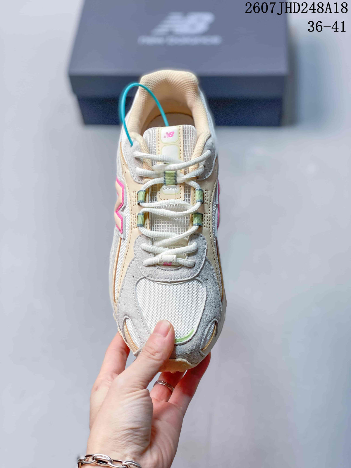 Cream and Gray New Balance 204L Low-Top Sneakers - product image from the listing.