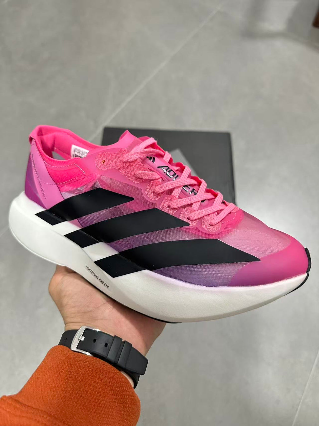 Pink adidas Lightstrike Pro Evo Running Shoes - product image from the listing.